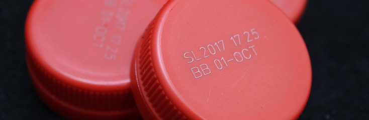 Laser marking on plastic taps