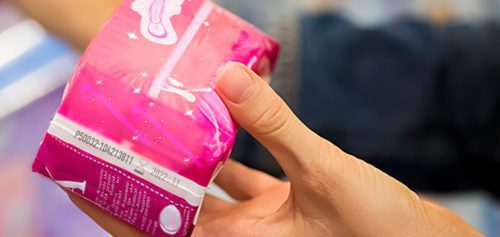 Laser marking on menstrual pad packaging