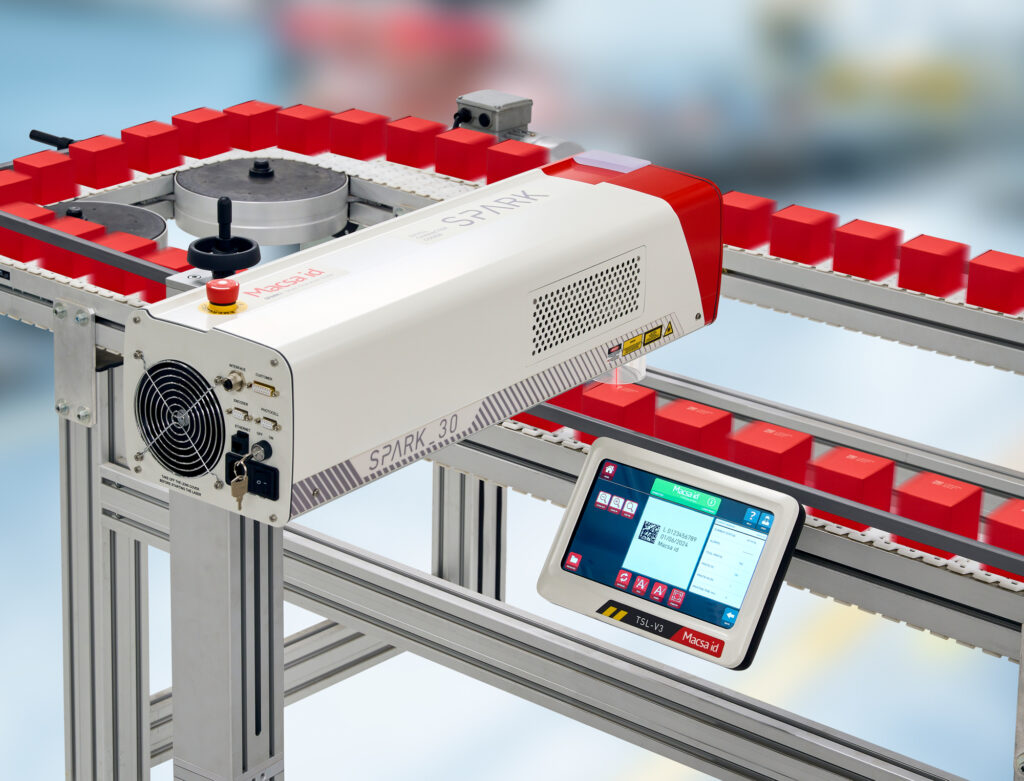 Laser coding system marking a DataMatrix code on packaging for product traceability